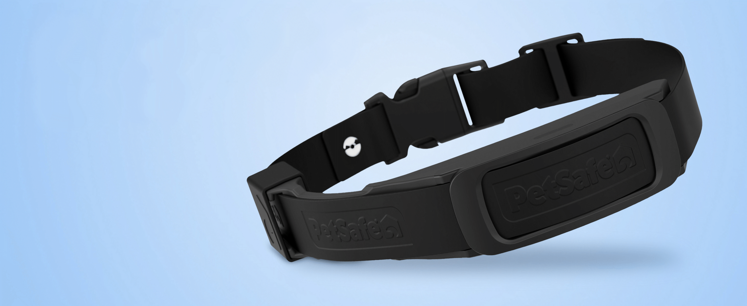 A black PetSafe dog collar with a small white icon and engraved PetSafe logo, placed on a light blue background.