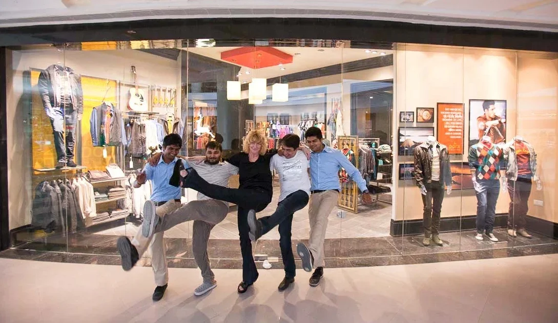 Chele and the Parx Team celebrate in front of Parx store