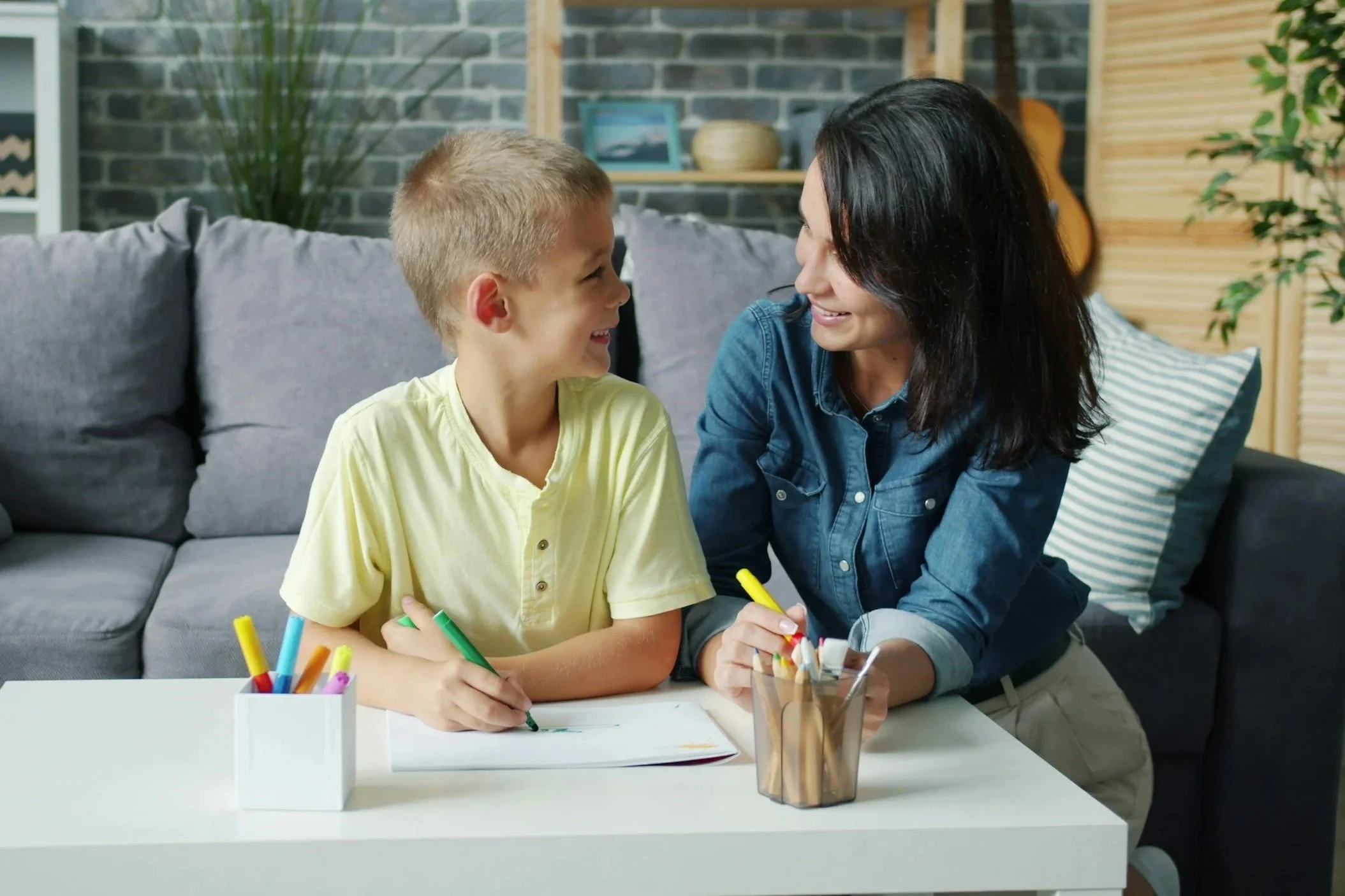 Mum and son drawing