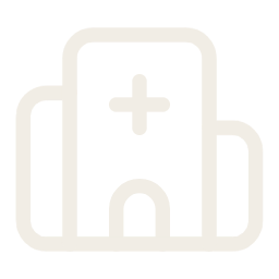 Hospital building icon with a cross on top