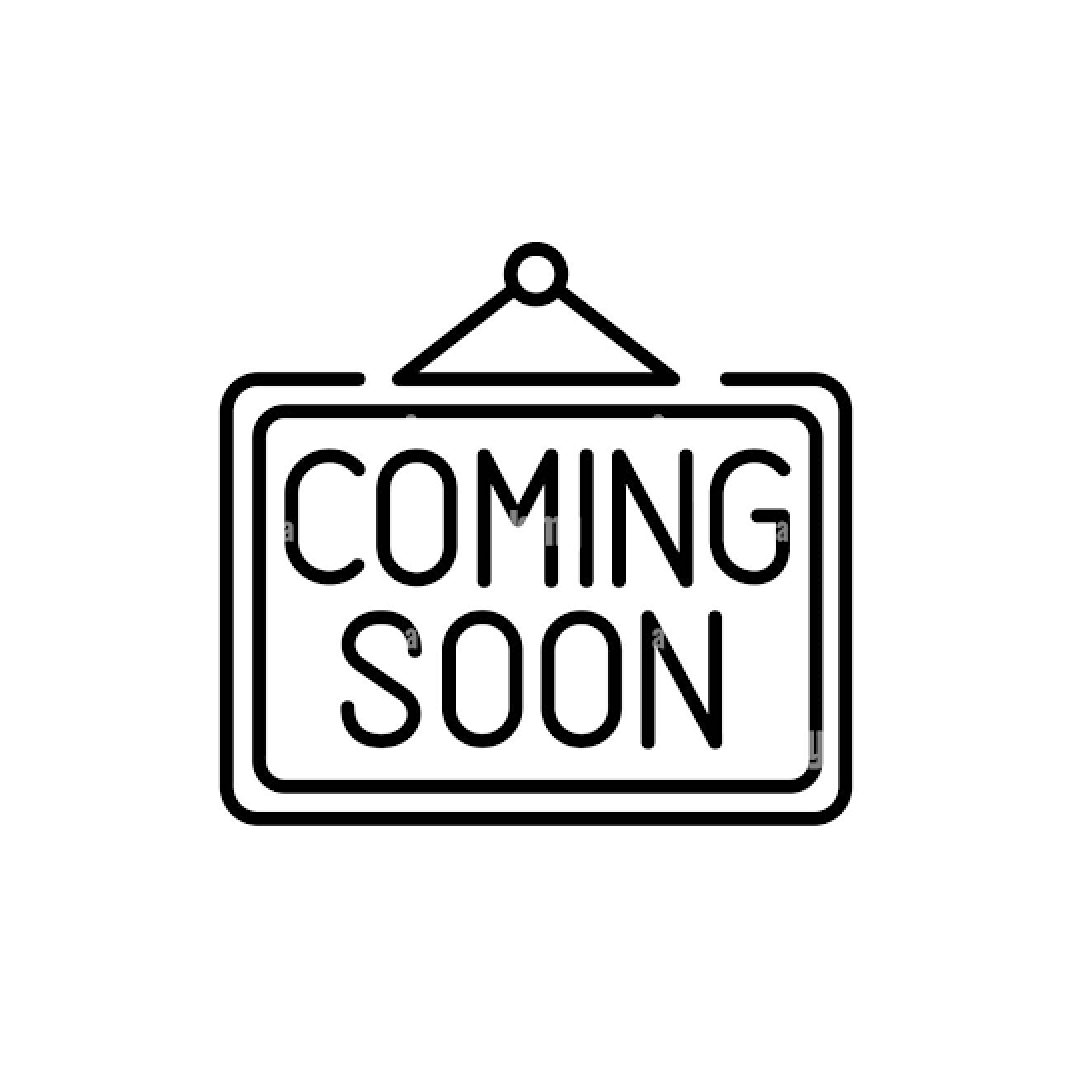 A sign with the text 'COMING SOON' hanging on a wall.