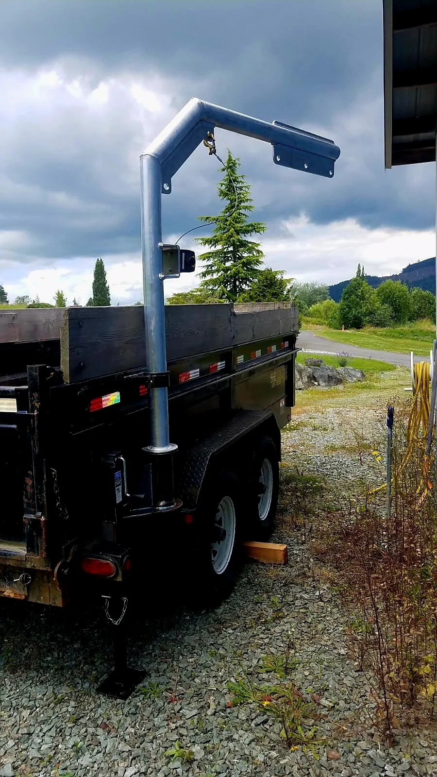 Heavy-duty custom steel or aluminum structural support for industrial trailer equipment.