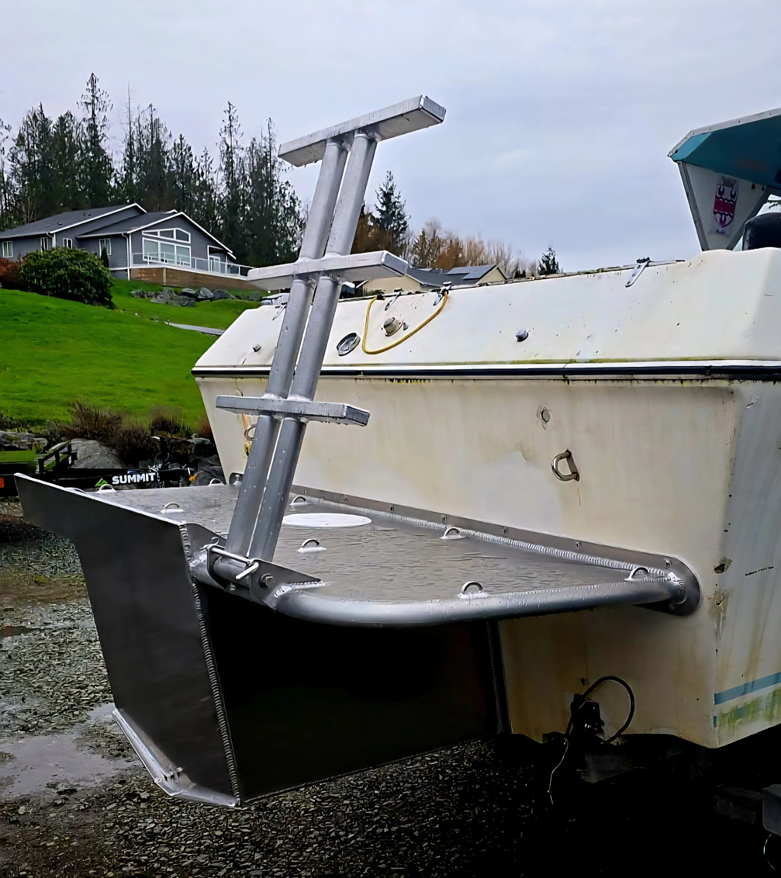 Custom marine aluminum swim platform and ladder fabrication for recreational vessels.