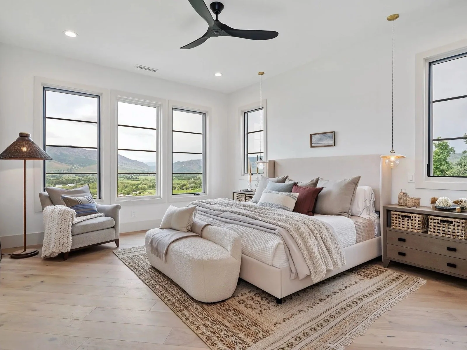 transitional-mountain-home-primary-bedroom-valley-view-large-windows-05.jpeg