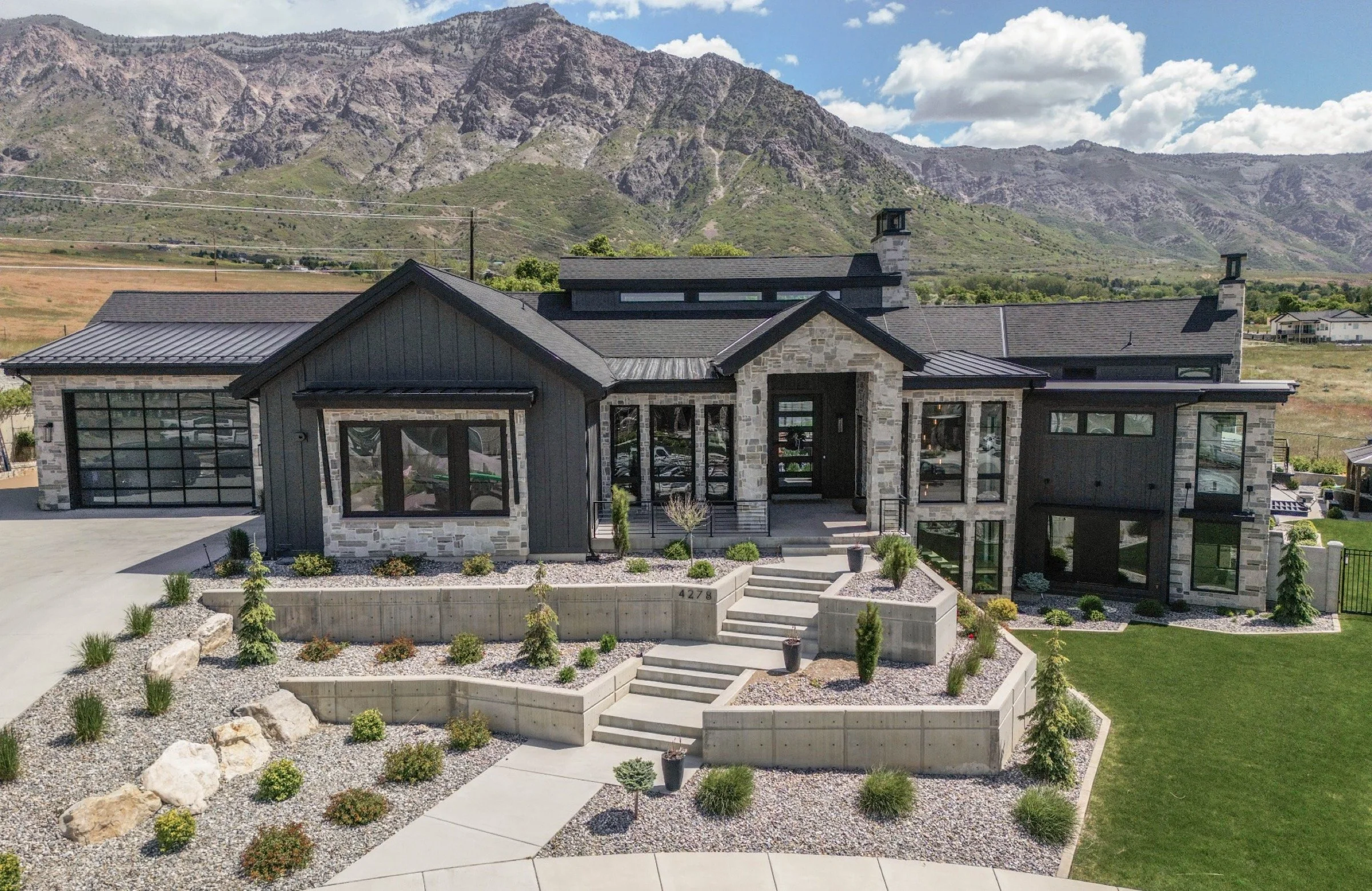 mountain-modern-custom-home-utah-stone-entry-mountain-view-02-hero_2400.jpeg