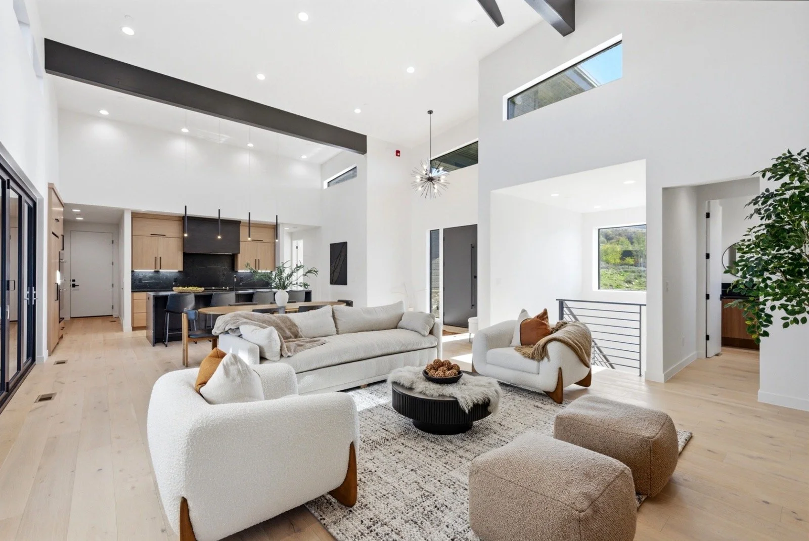 modern-mountain-home-open-living-room-kitchen-interior.jpeg