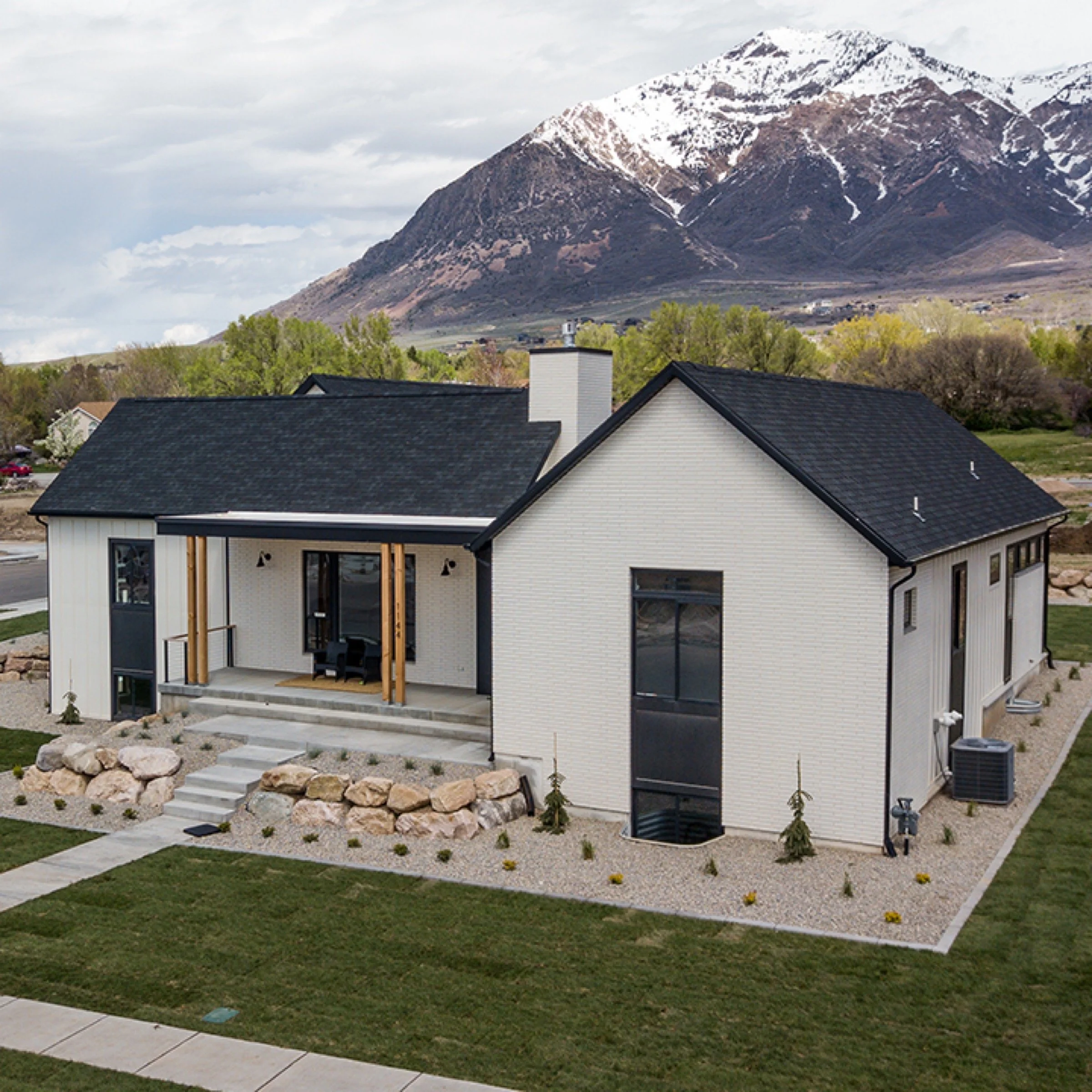 modern-farmhouse-transitional-white-brick-aerial-exterior-thumbnail-06.jpeg