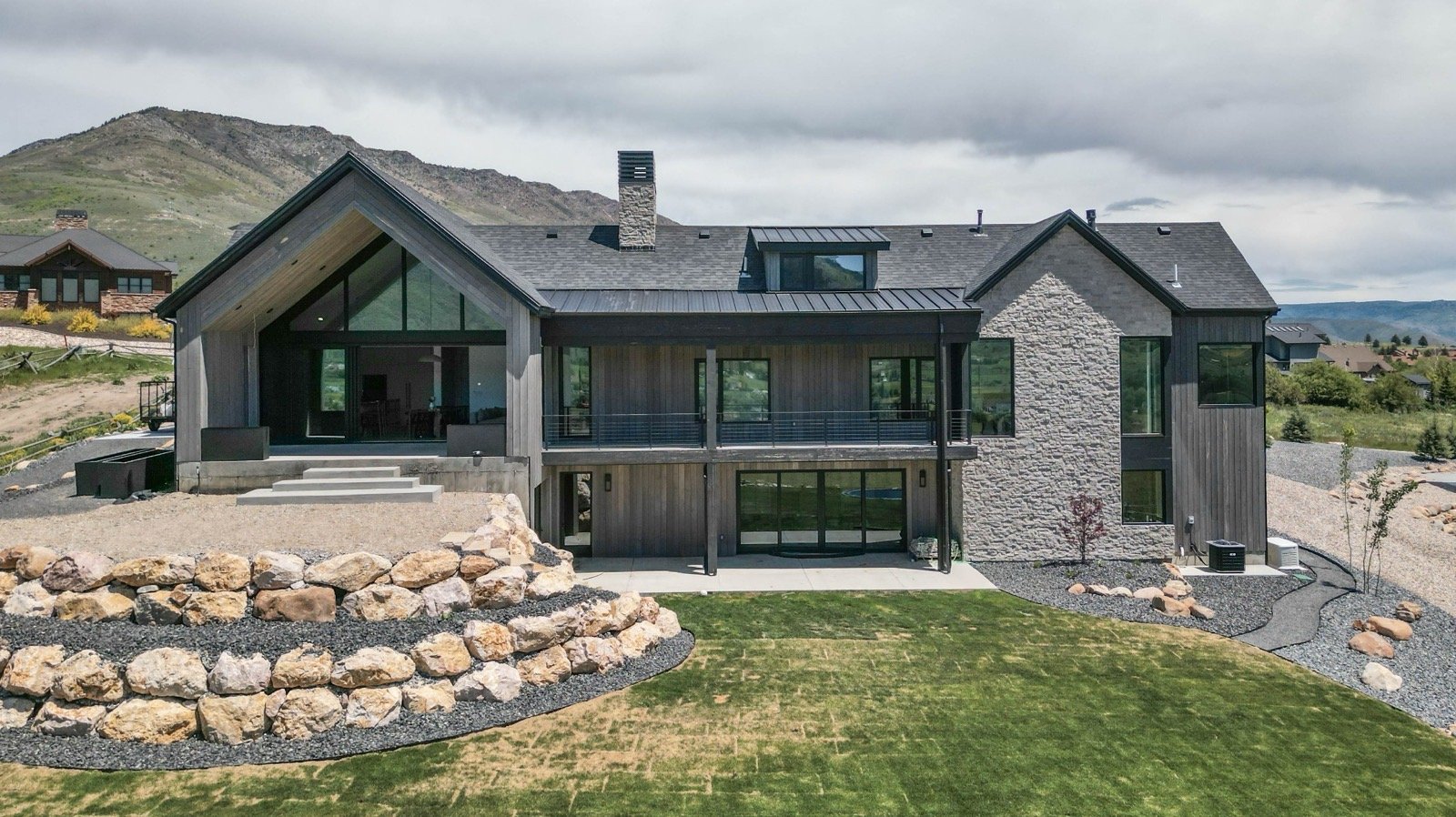 mountain-modern-custom-home-utah-rear-exterior-covered-deck-04-gallery_1600.jpeg