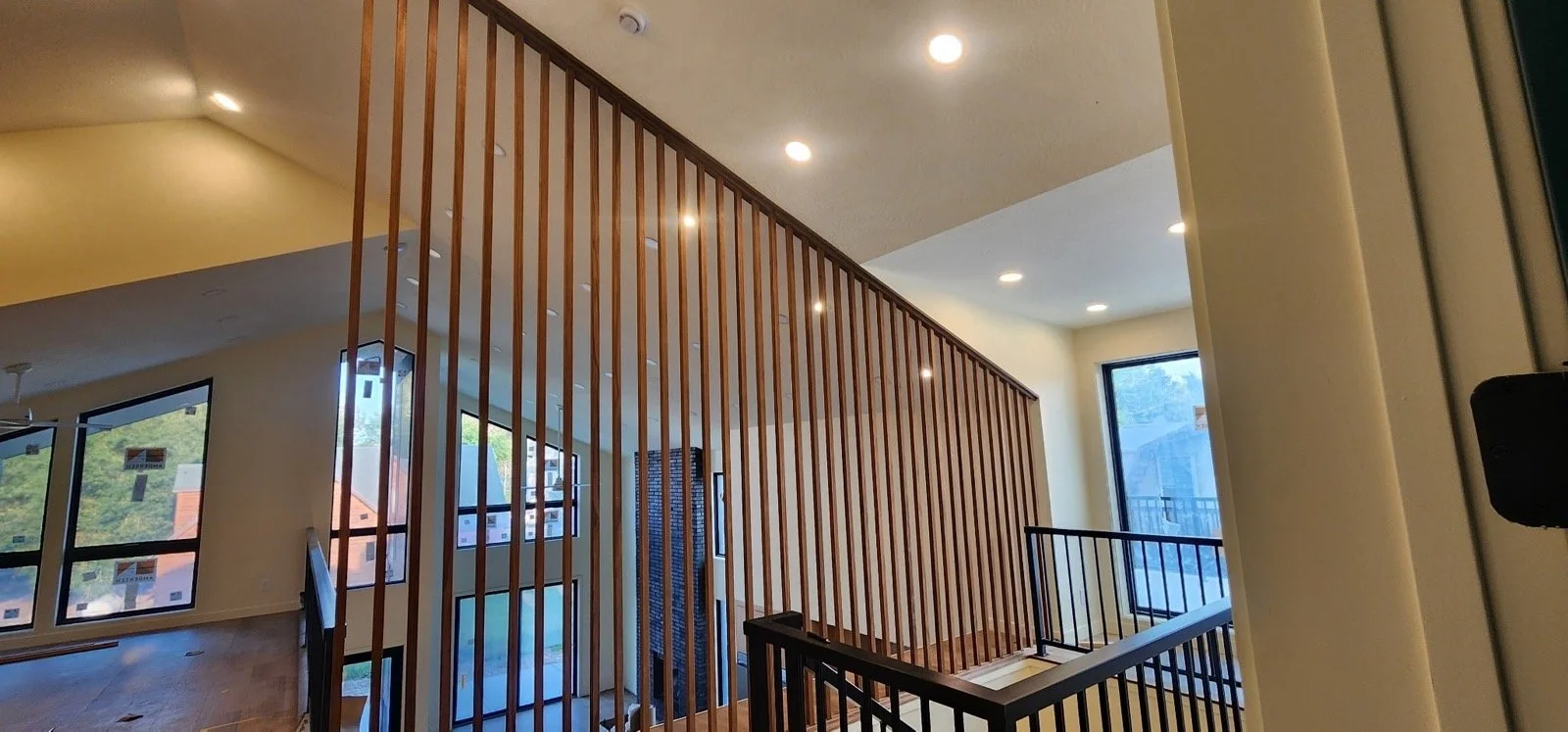 blackwood-residence-vertical-wood-slat-stair-screen.jpeg
