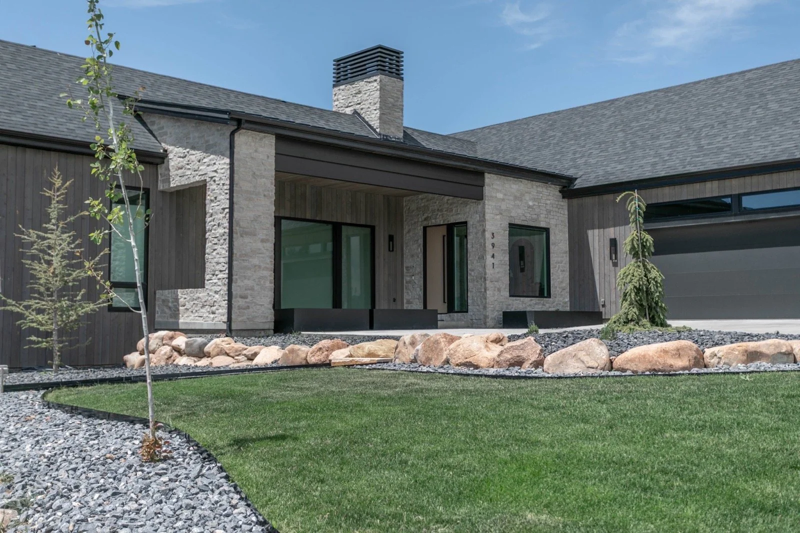 mountain-modern-custom-home-utah-gabled-entry-rock-landscape-09-gallery_1600.jpeg