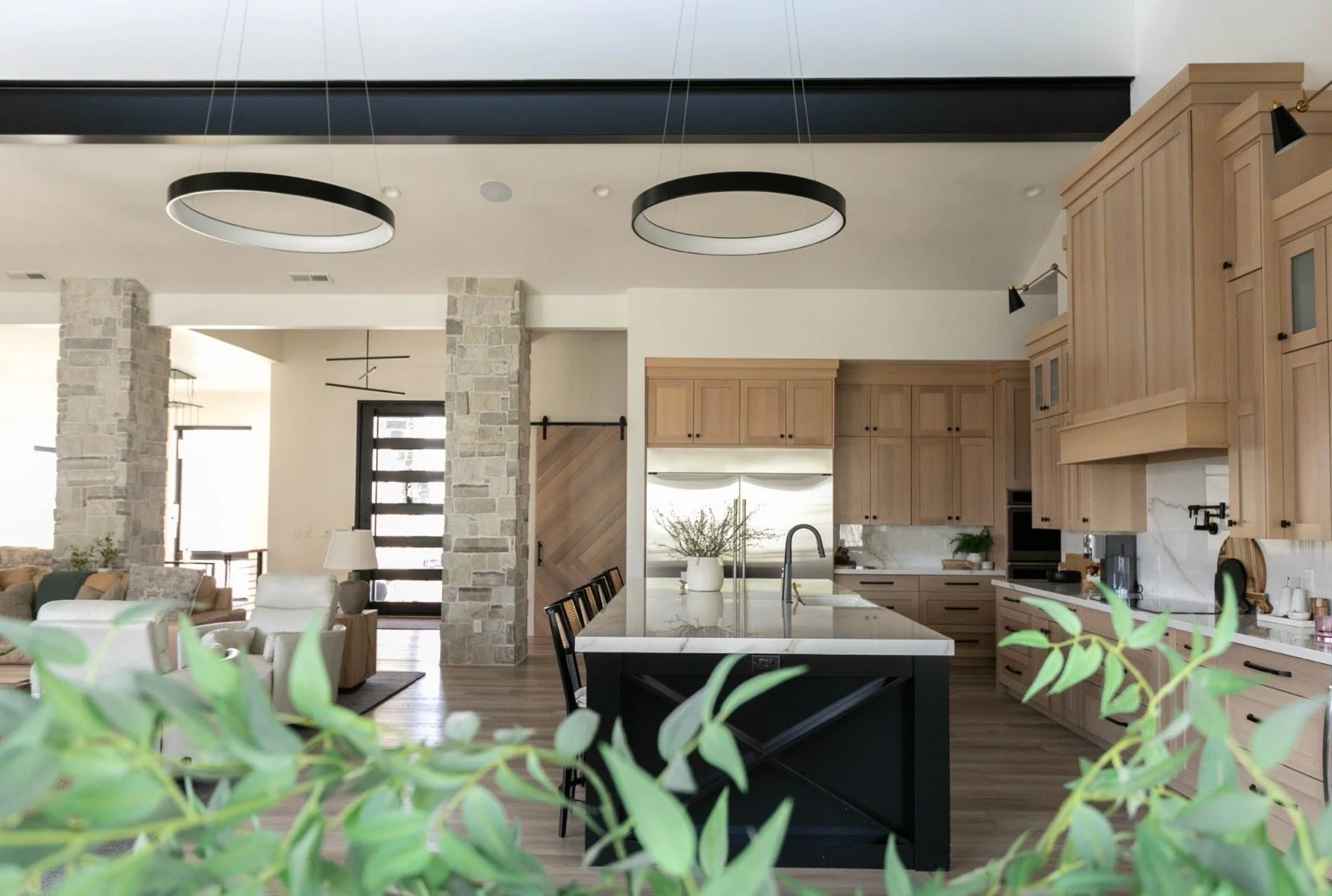 mountain-modern-custom-home-utah-kitchen-great-room-stone-columns-11-gallery_1600.jpeg