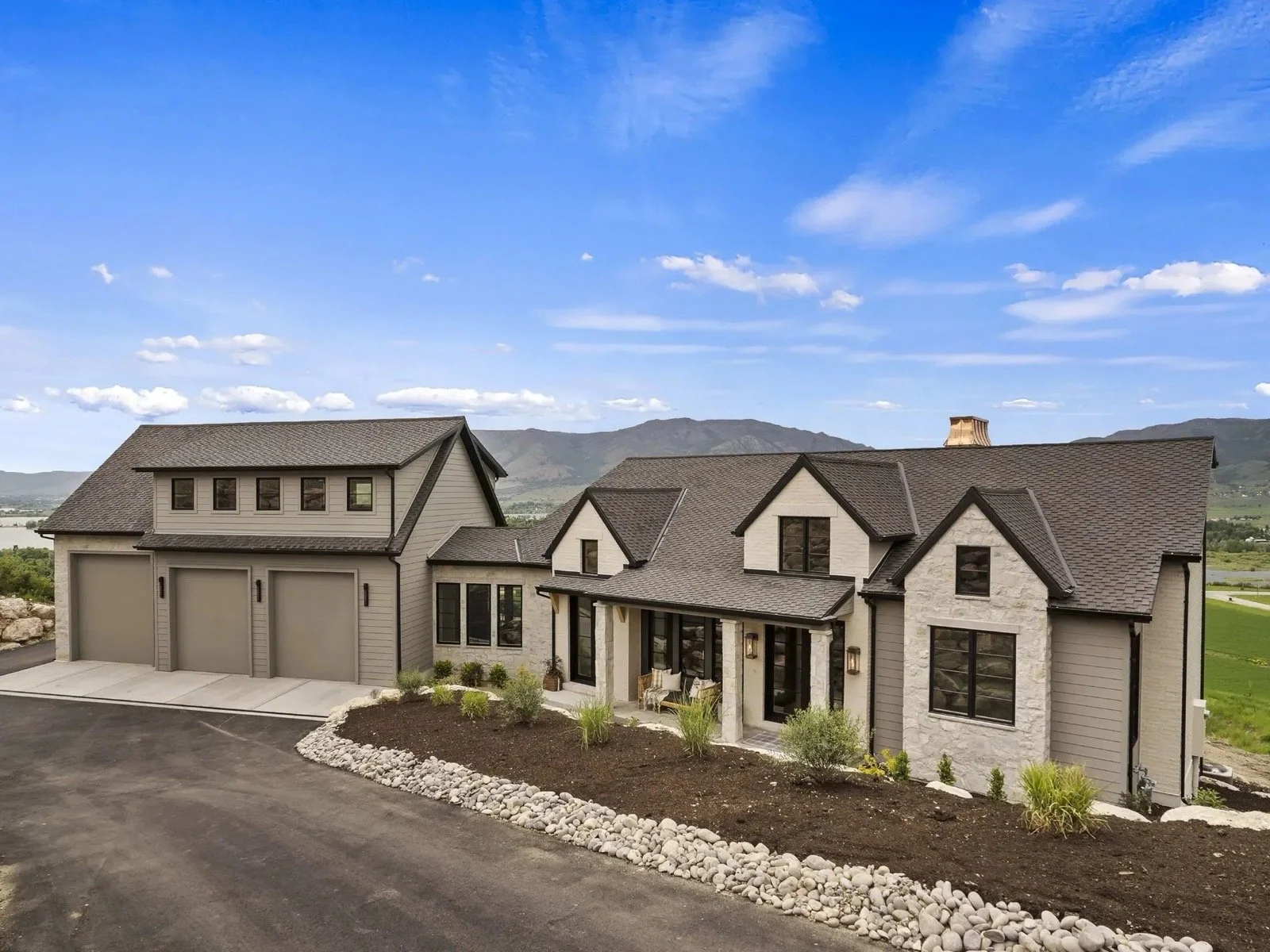 transitional-modern-farmhouse-mountain-home-stone-exterior-huntsville-utah-06.jpeg