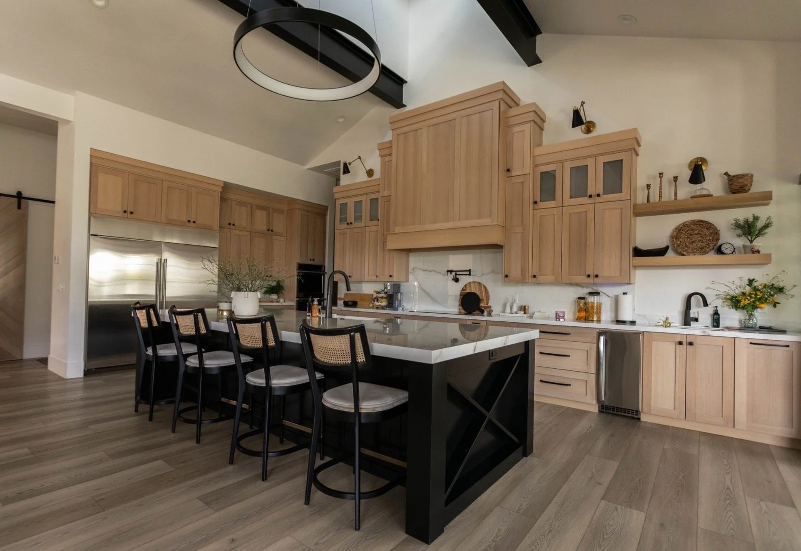mountain-modern-custom-home-utah-wood-cabinet-kitchen-black-island-12-gallery_1600.jpeg
