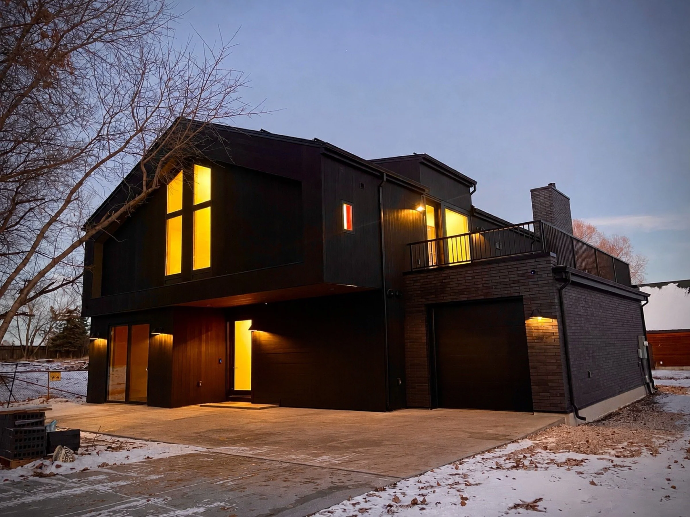 blackwood-residence-modern-black-home-dusk-exterior.jpeg