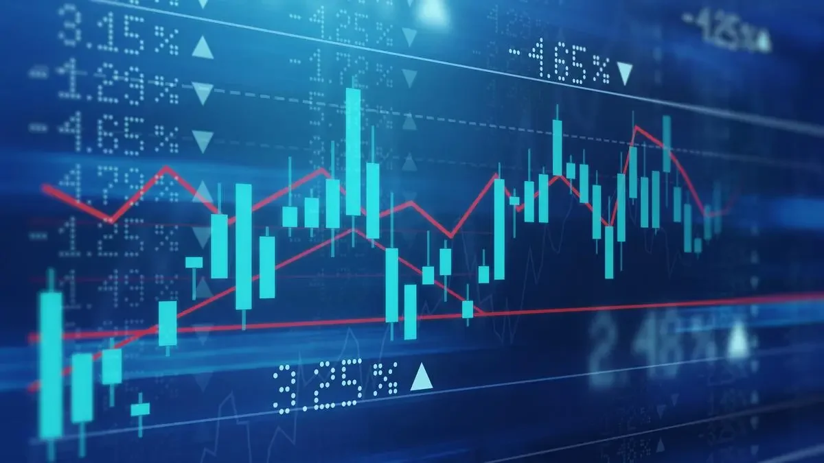 Digital stock market chart with blue candlesticks, red and blue trend lines, and percentage indicators on a blue background.