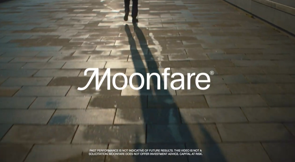 Shadows of a person walking on a paved street during sunset, with the word 'Moonfare' overlayed in the center.
