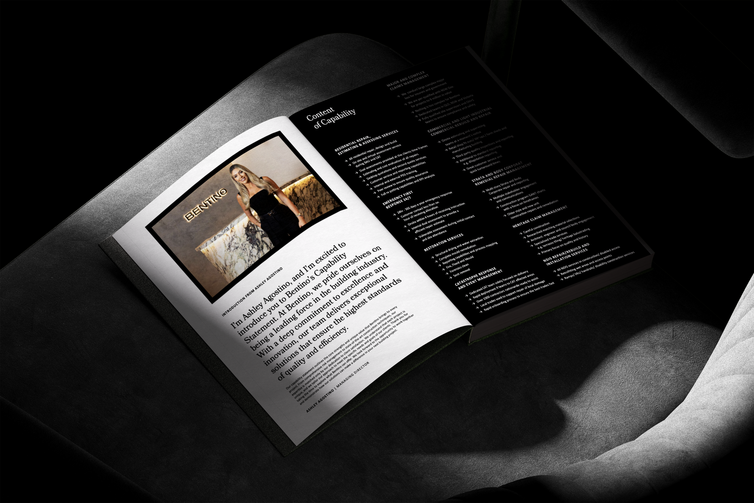 Open magazine on a dark surface, showing a page with a photo of a woman and text about Bentino, a construction company.