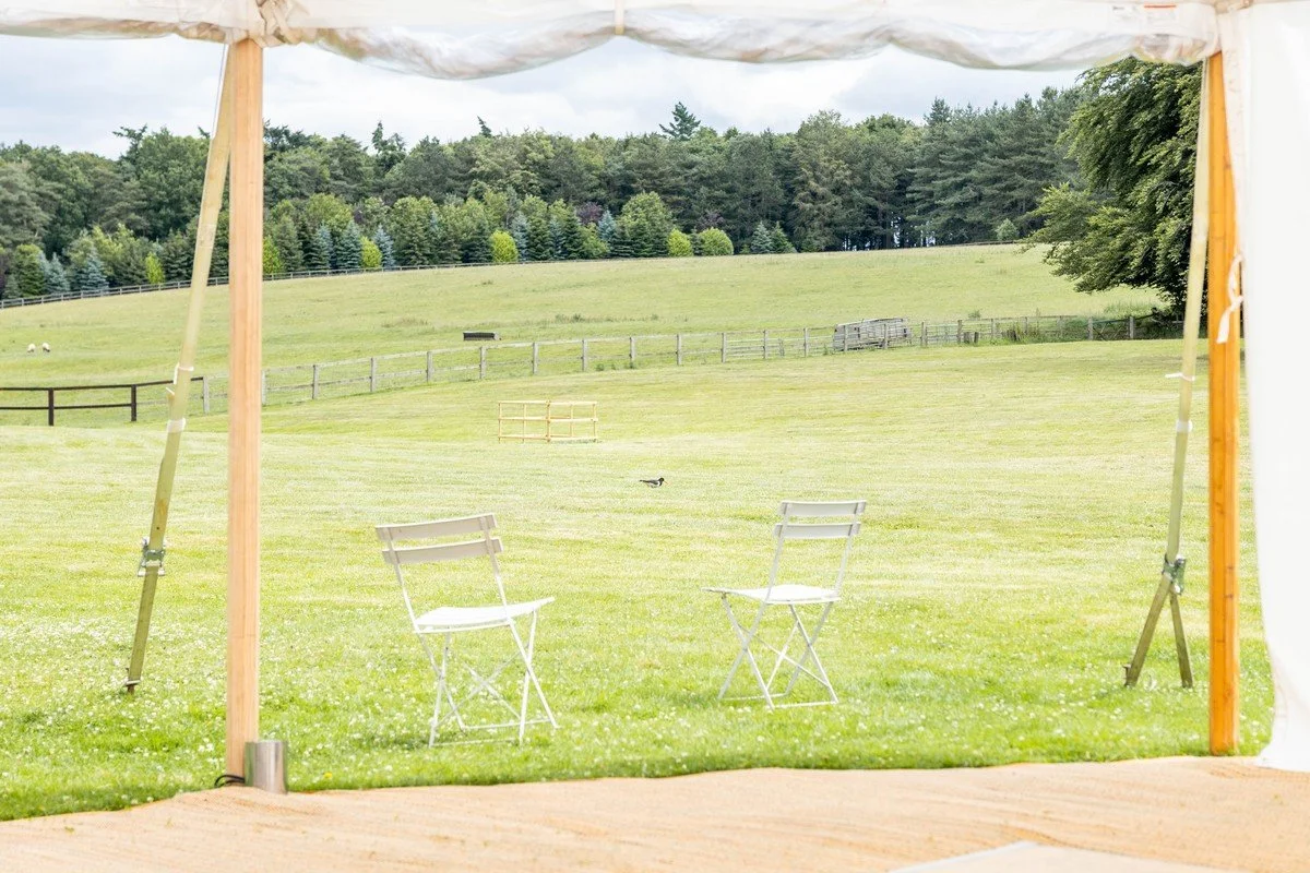 The view over the meadows from a wedding marquee in the grounds of Meadow House on the West Barsham Estate