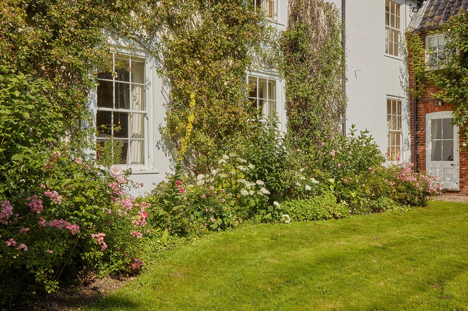 The flower-filled garden at Meadow House