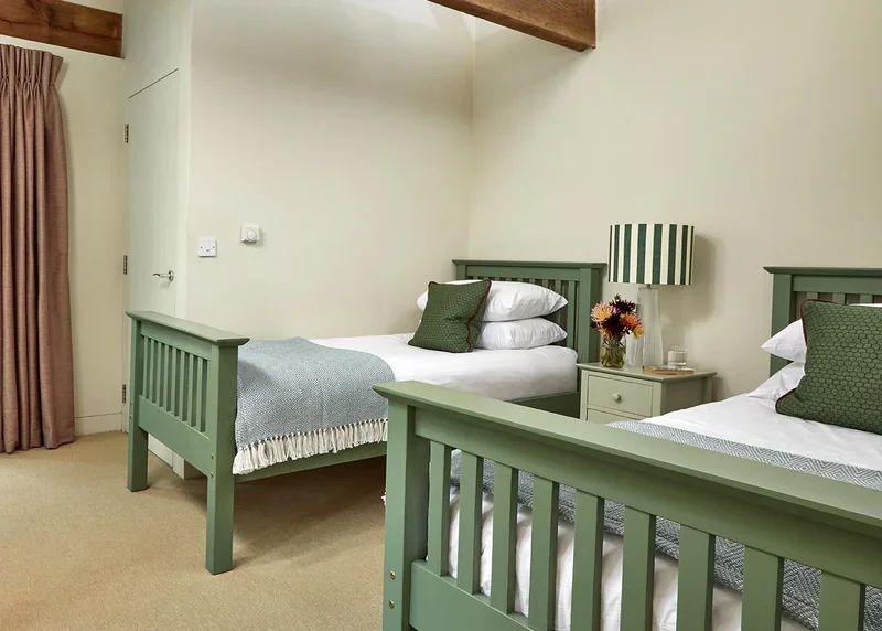 A colourful twin bedroom in Great East
