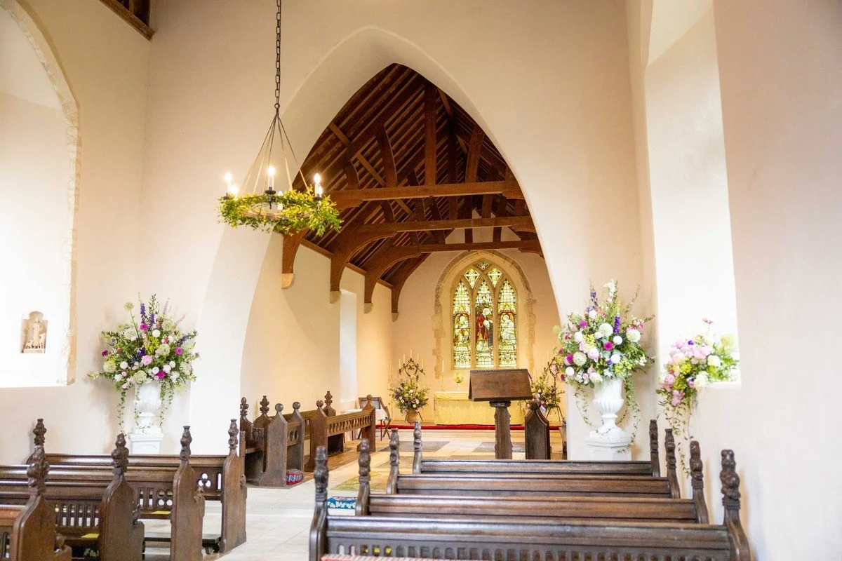 Interior of the one of the churches on the West Barsham Estate with flowers for a wedding