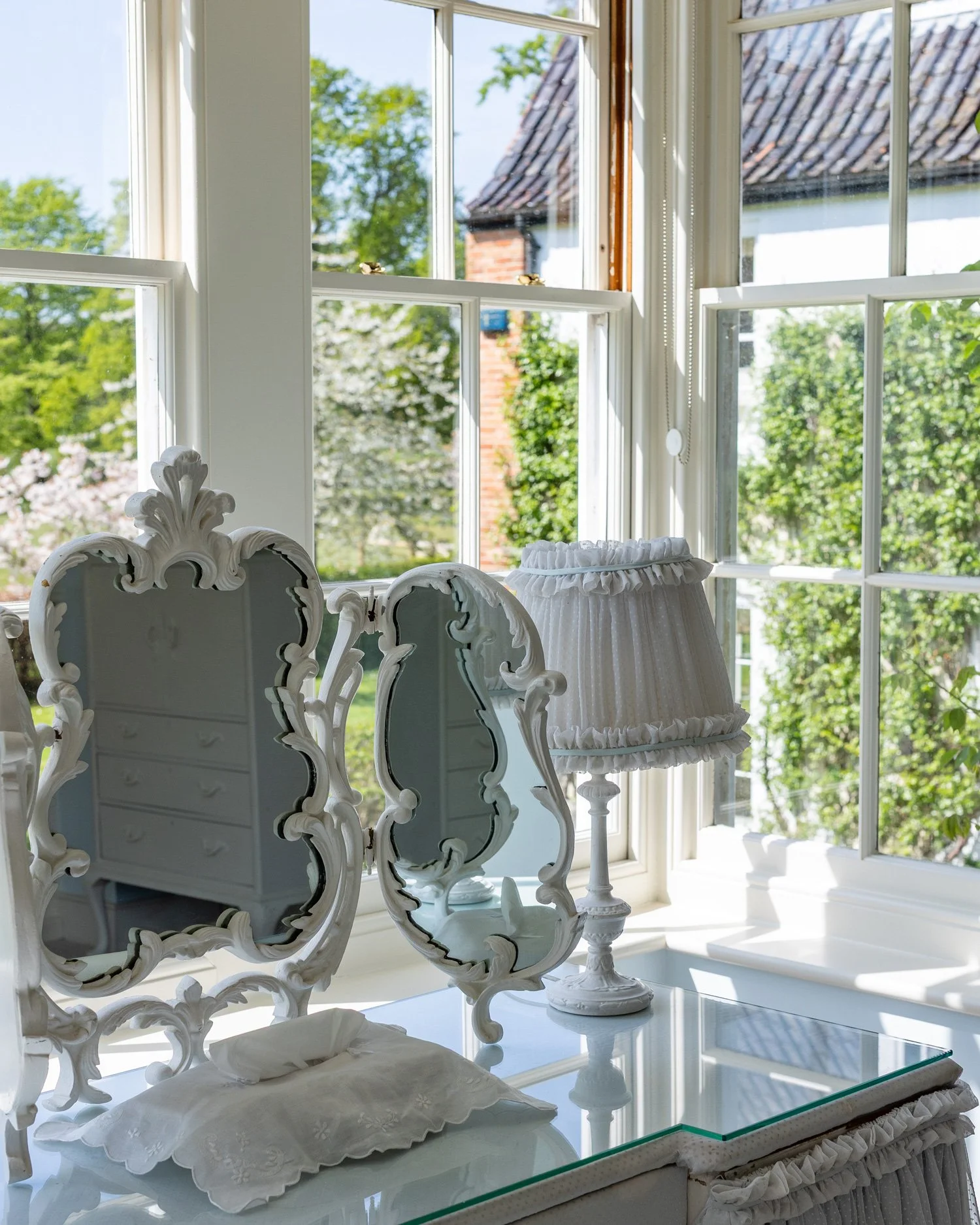 The dressing table looking out over the rose-filled gardens at Meadow House