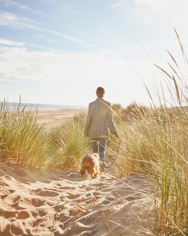 Walking through the dunes towards the sand at Holkham Beach in North Norfolk, a short drive from the Barsham Estate