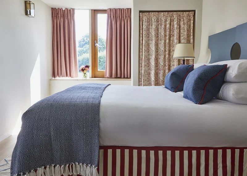 Double bedroom in Great East with views over gardens and meadows
