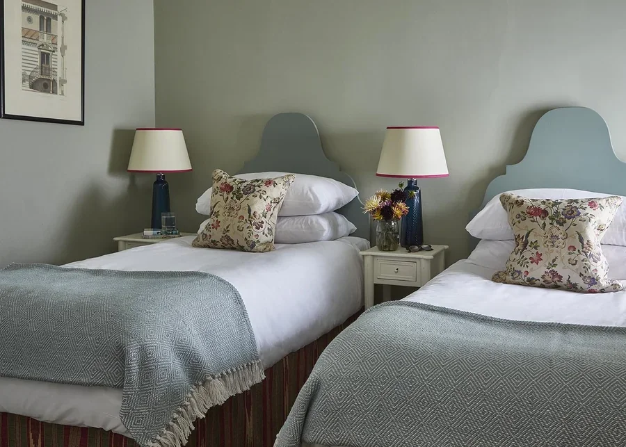 A bright twin bedroom in Long Meadow, perfect for children, families or friends