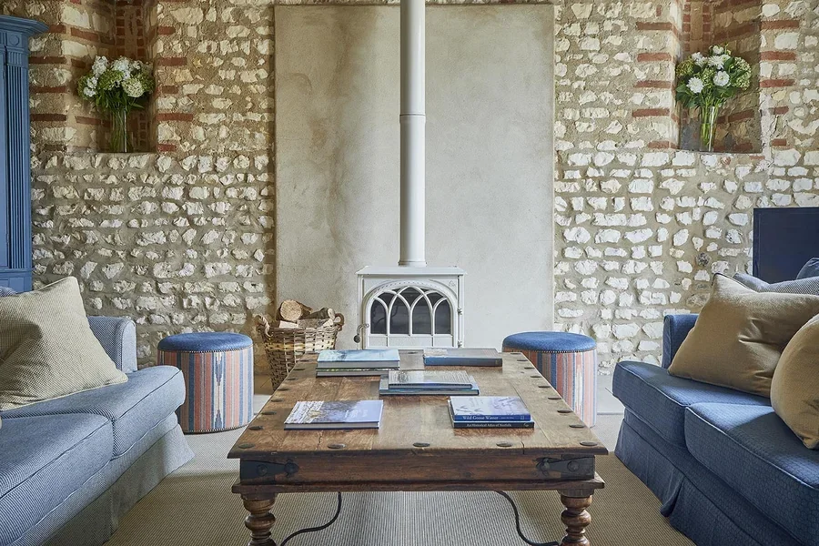 The striking sitting room with wood burner in Long Meadow