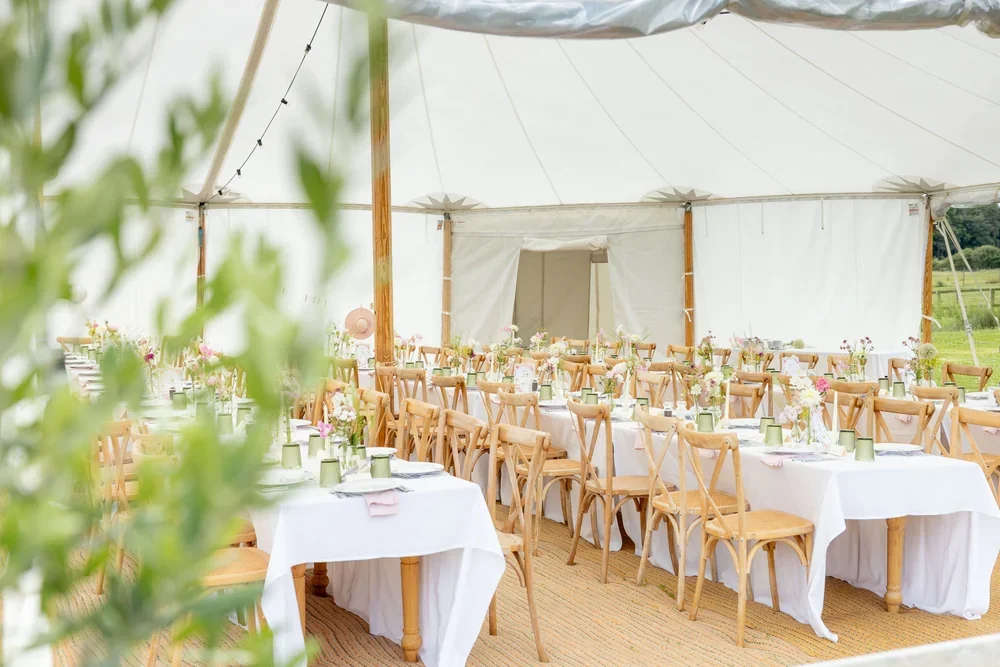 A beautiful traditional marquee ready for guests during a wedding at Meadow House on the West Barsham Estate