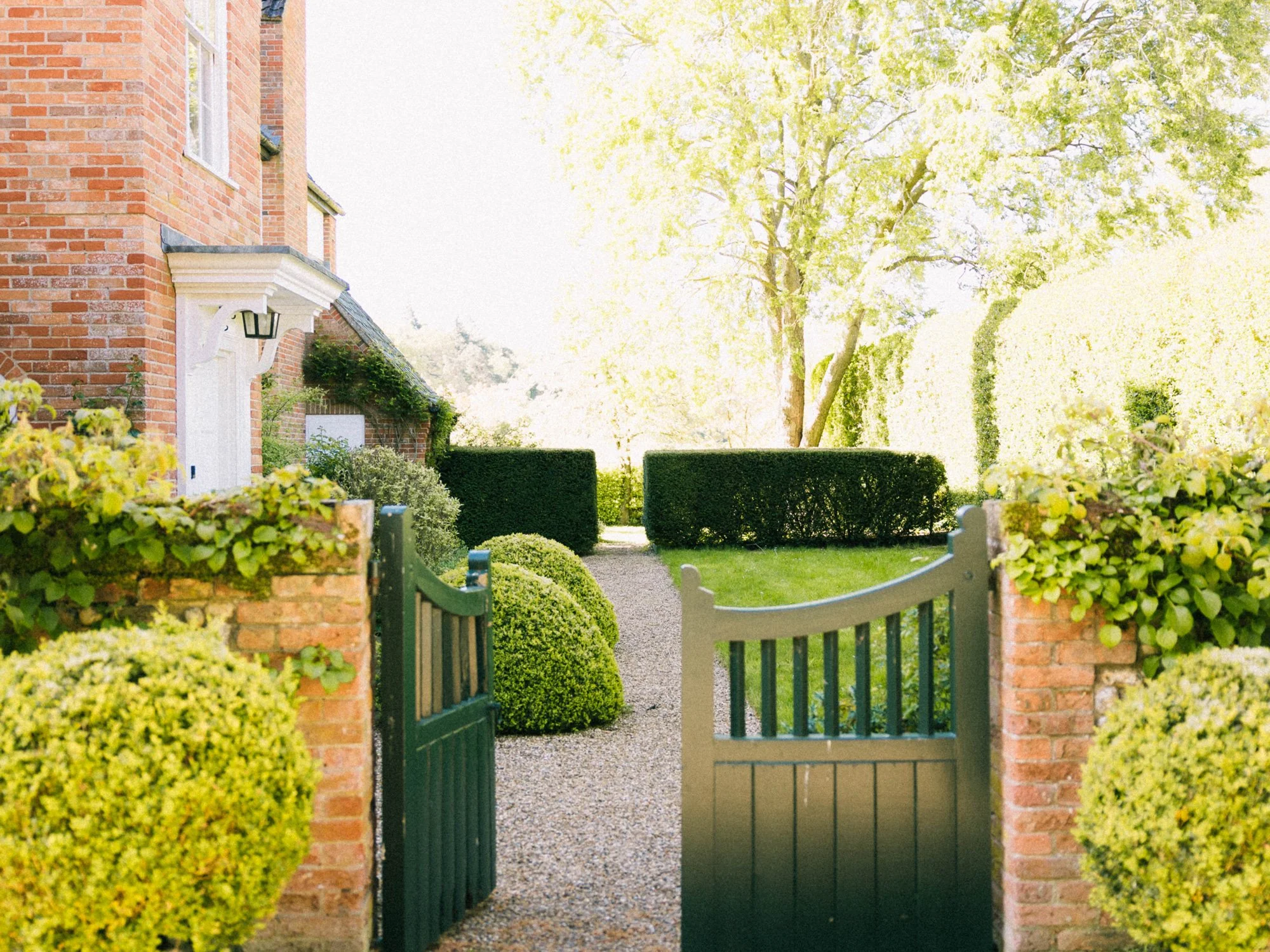 The garden gate leading to the front entrance of Meadow House, the original hall house for the estate
