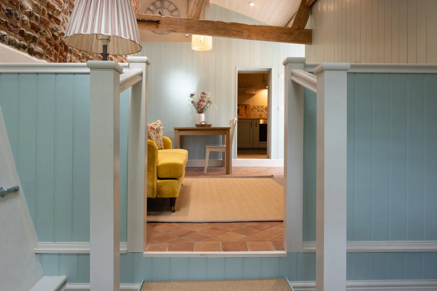 Little Sandford's spacious living and dining area, from the bedroom nook