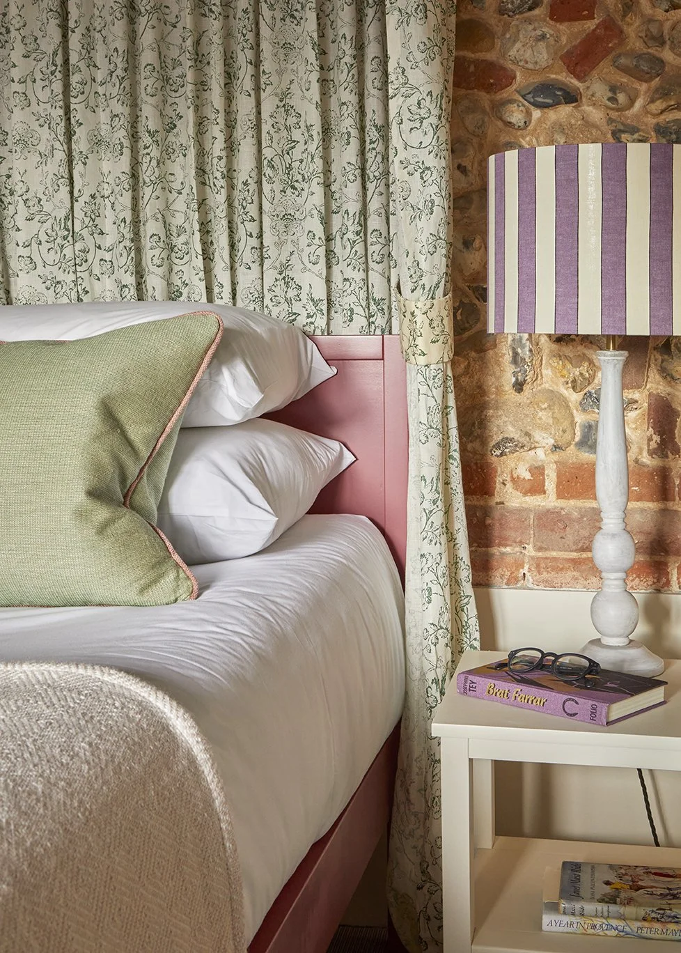 Detail of the four poster bed hung with Flora Soames fabrics in Little Barsham