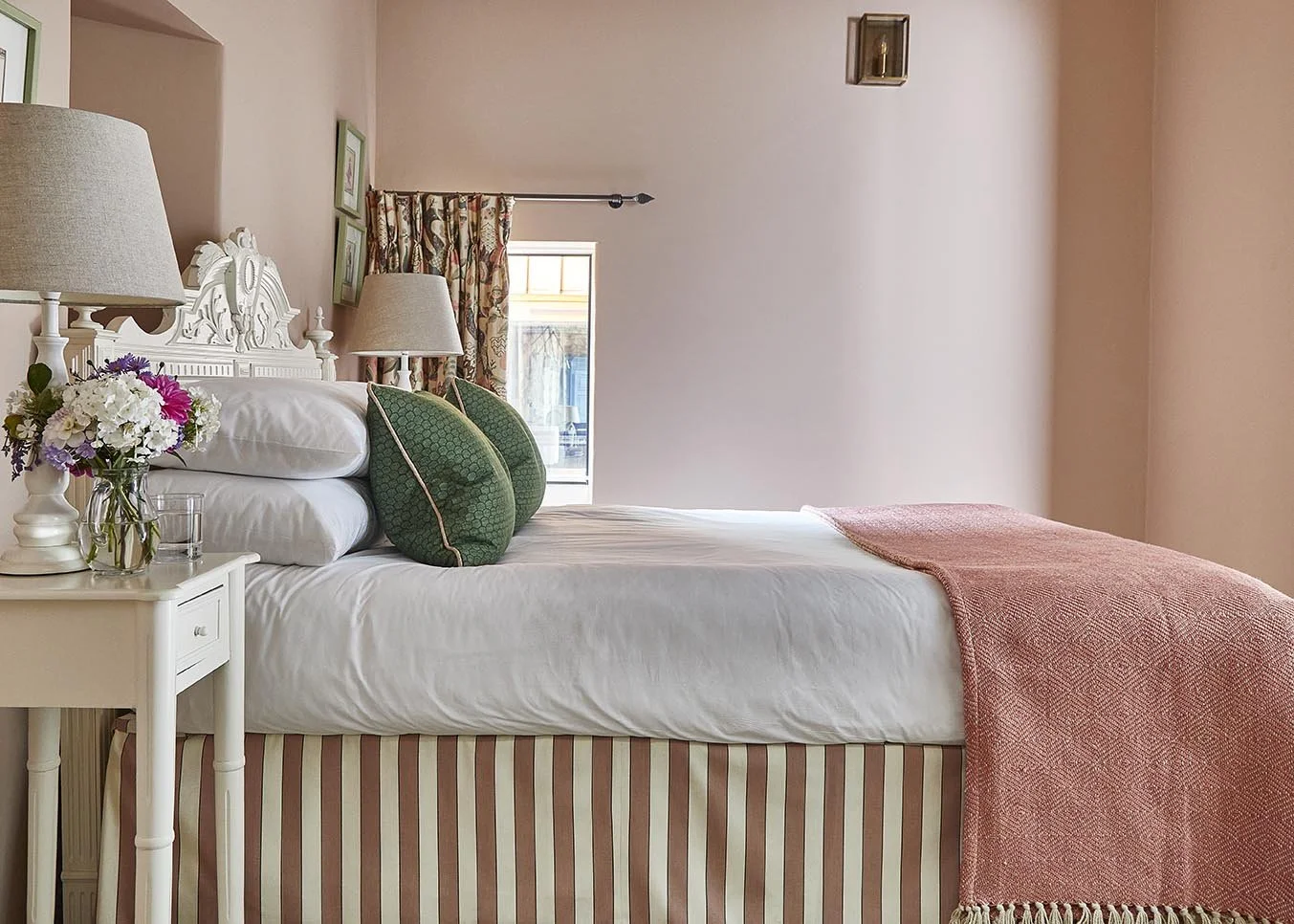 An elegant double bedroom in Long Meadow with Flora Soames fabrics