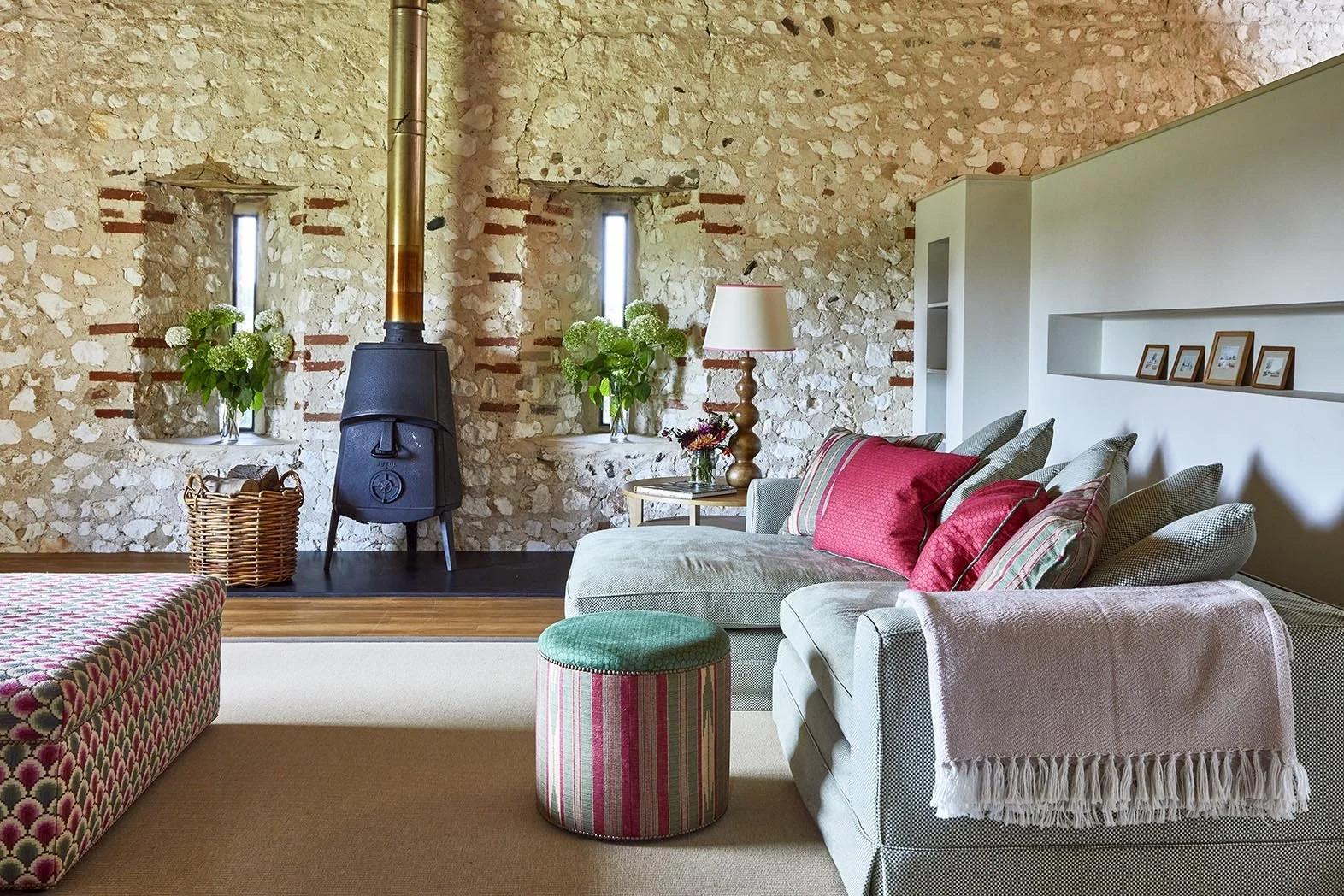 The vaulted first floor sitting room with wood burner in Great East