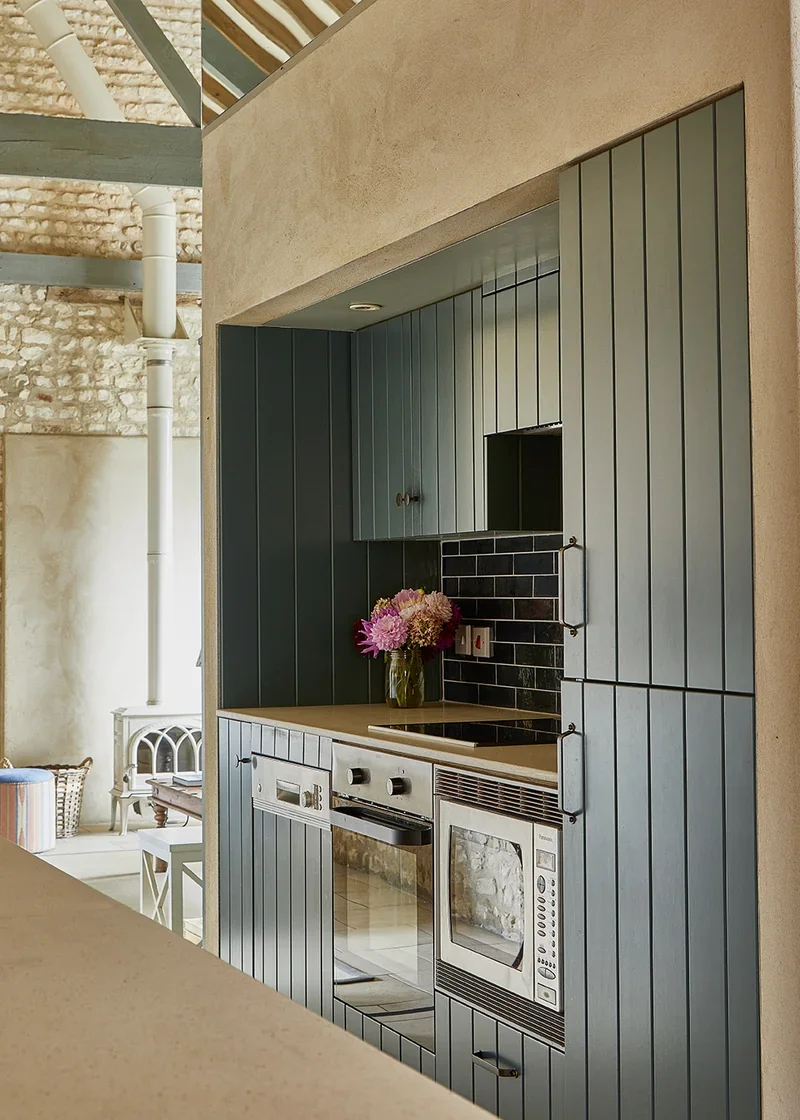 The airy open-plan kitchen area leading on to the living area in Long Meadow