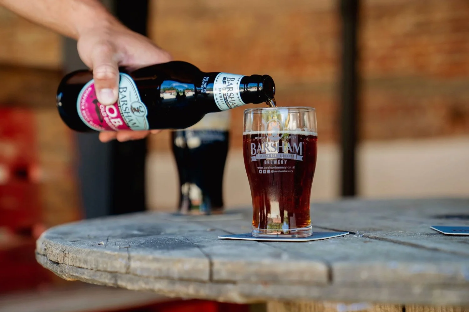 Barsham Brewery's beer, Bitter Old Bustard, being poured into a pint glass