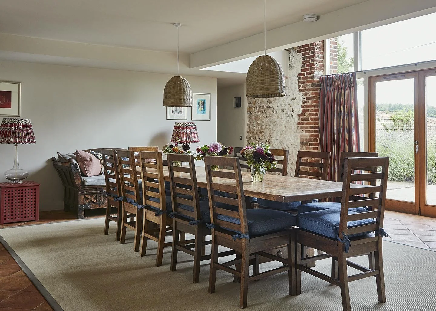 The bright dining room in High Barsham with double doors out onto the garden