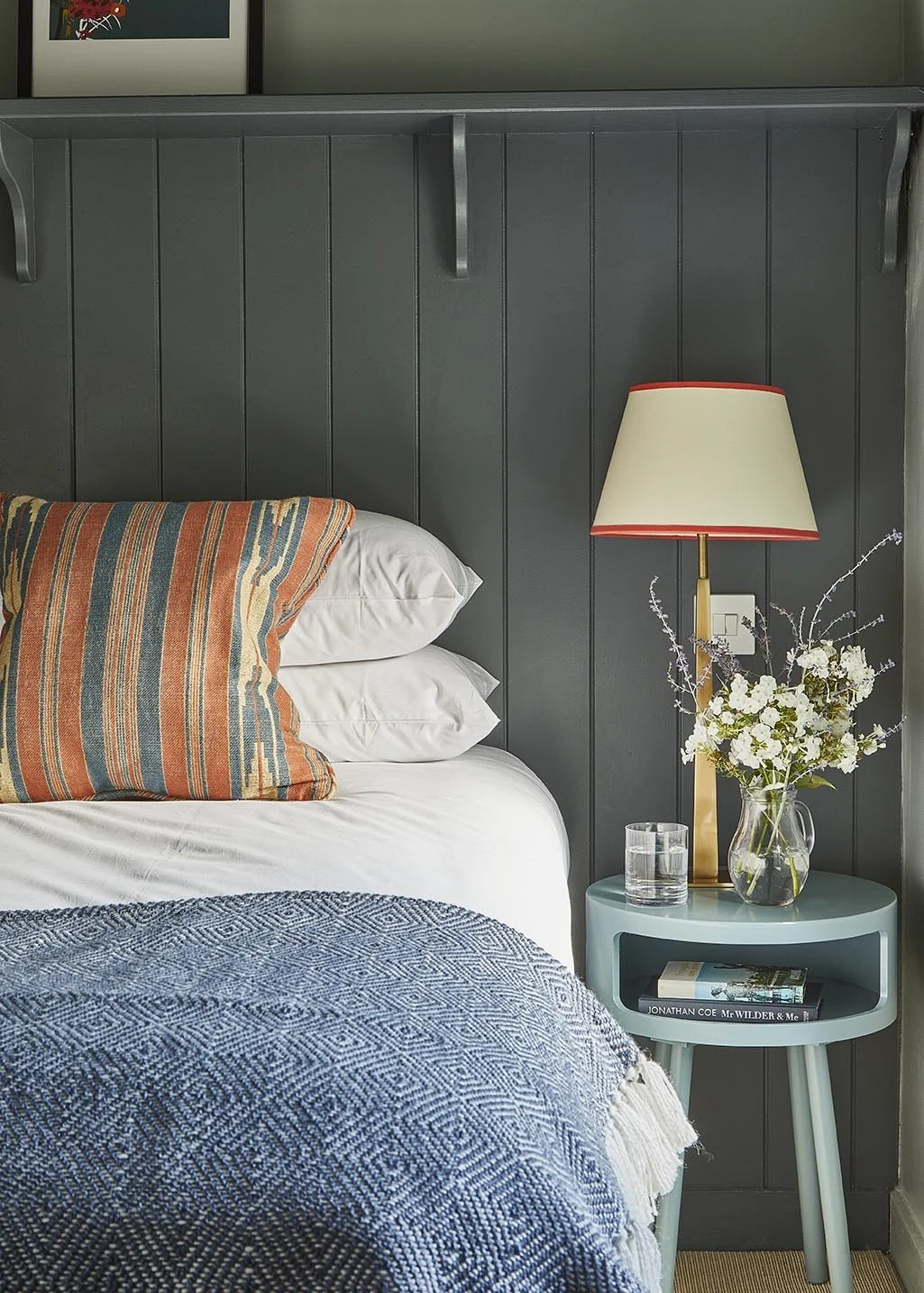 Detail of the twin bedroom in rich blues in The Loose Box