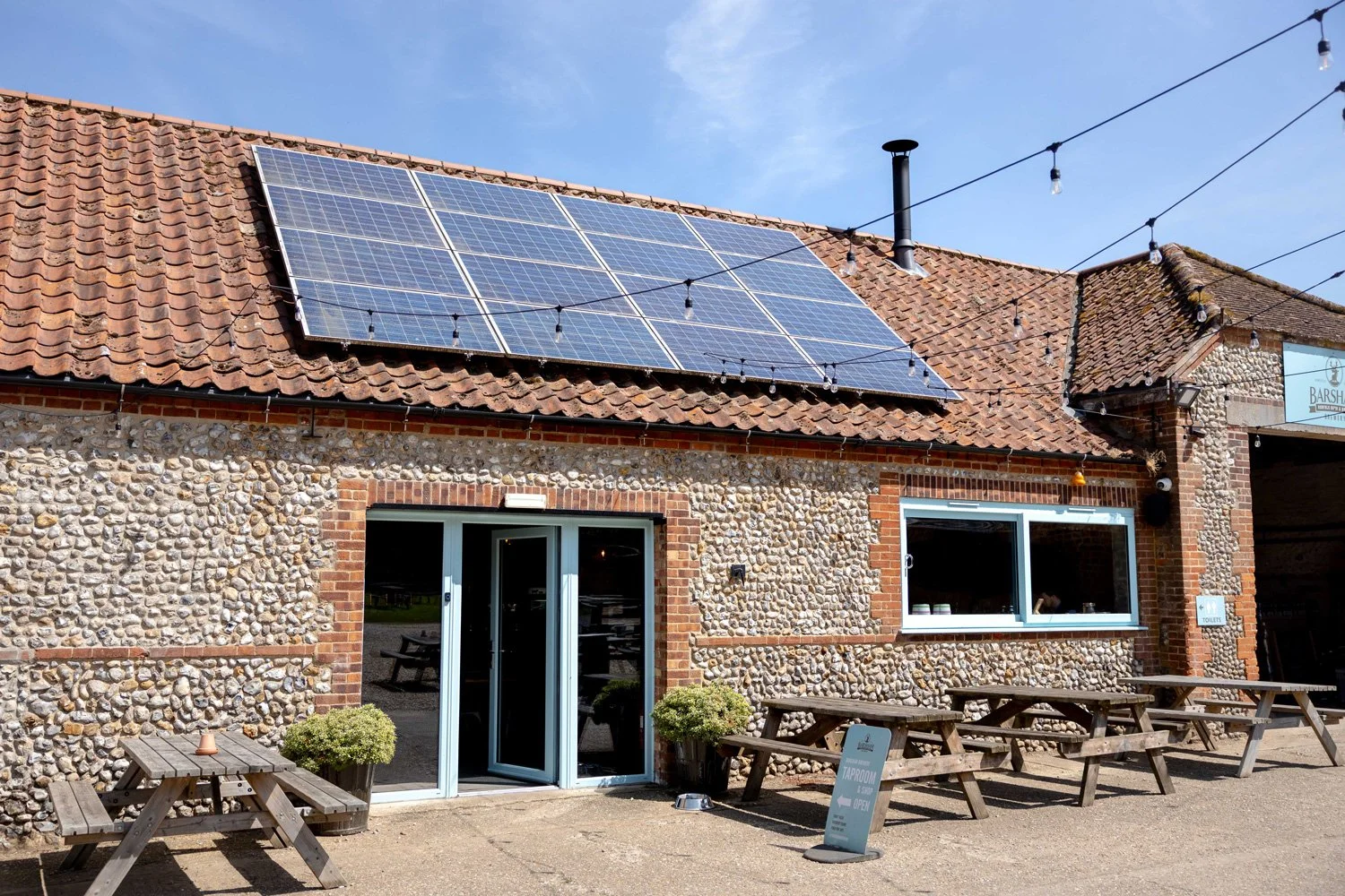 The exterior of The Taproom in the StackYard at Barsham Brewery