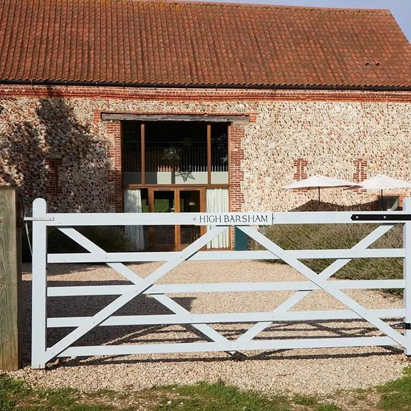 The exterior of High Barsham, one of the Barsham Estate's larger self-catering holiday barns