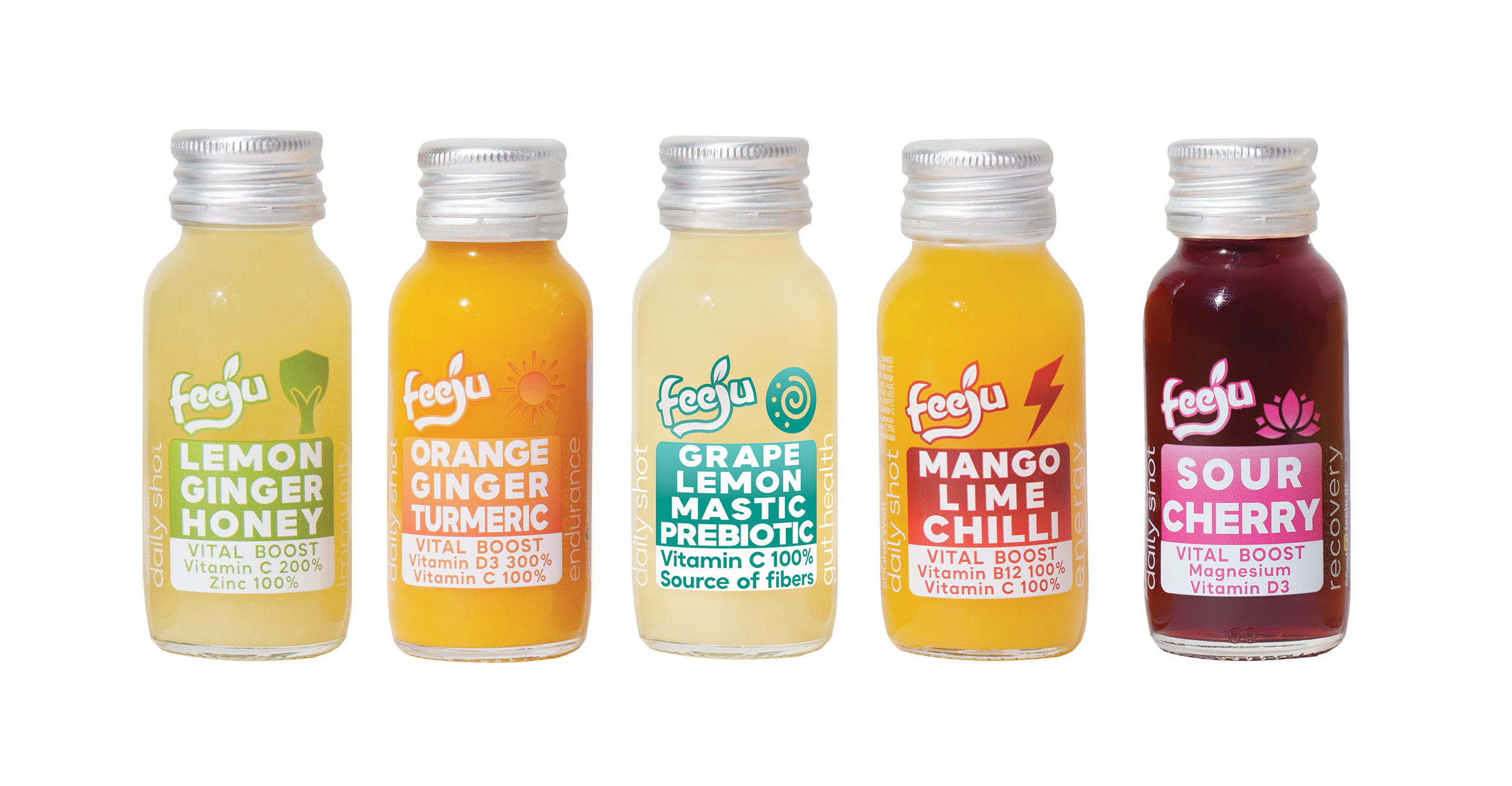 Five small bottles of flavored liquid supplements arranged in a row. The flavors from left to right are Lemon Ginger Honey, Orange Ginger Turmeric, Grape Lemon Mastic Prebiotic, Mango Lime Chilli, and Sour Cherry. Each label highlights vitamins and ingredients.