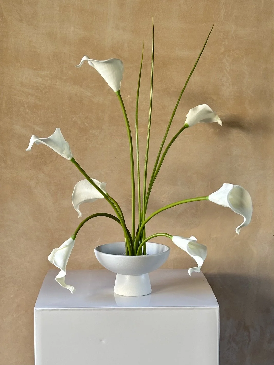 Totally bespoke bud vase variation with Cala Lilies and grass