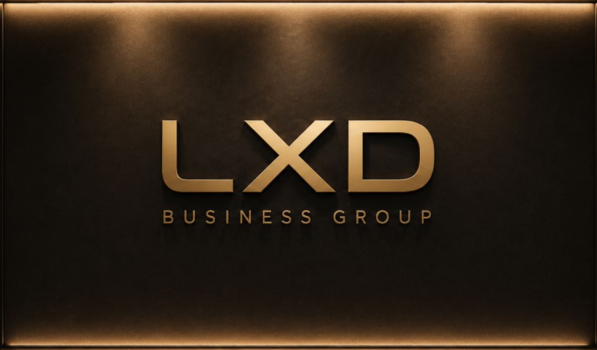 LXD Business Group logo in gold letters on a black wall