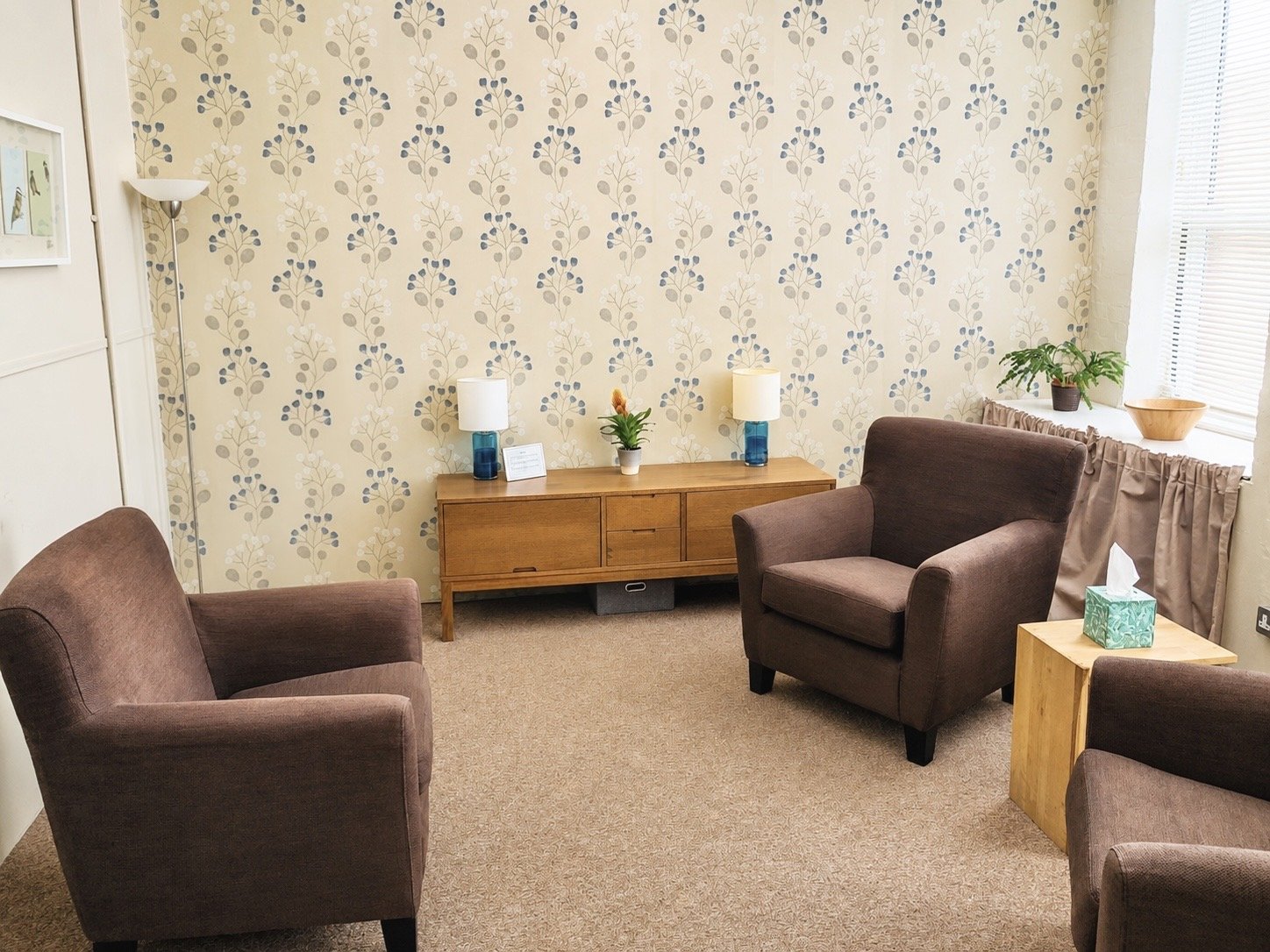 Comfortable therapy room in Canary Wharf for in-person psychotherapy and counselling sessions.