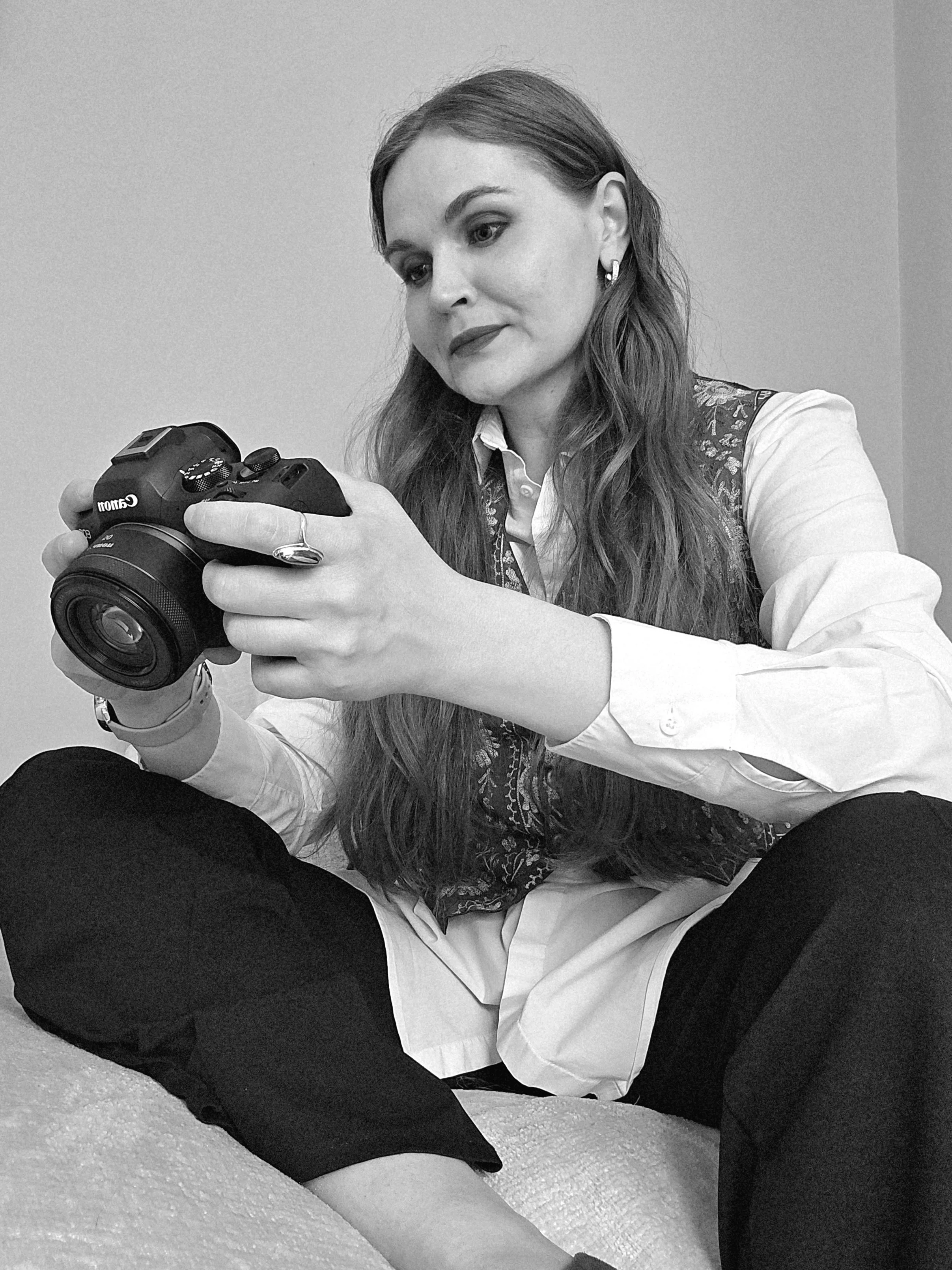 A professional family and lifestyle photographer looking at the camera, based in Camberley, Surrey.