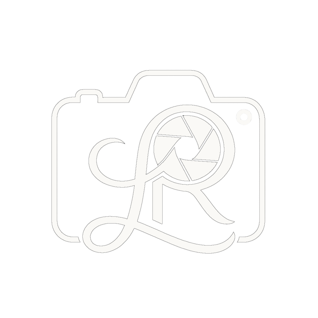 Outline of a camera with a stylized 'QR' and camera aperture icon integrated into the design.