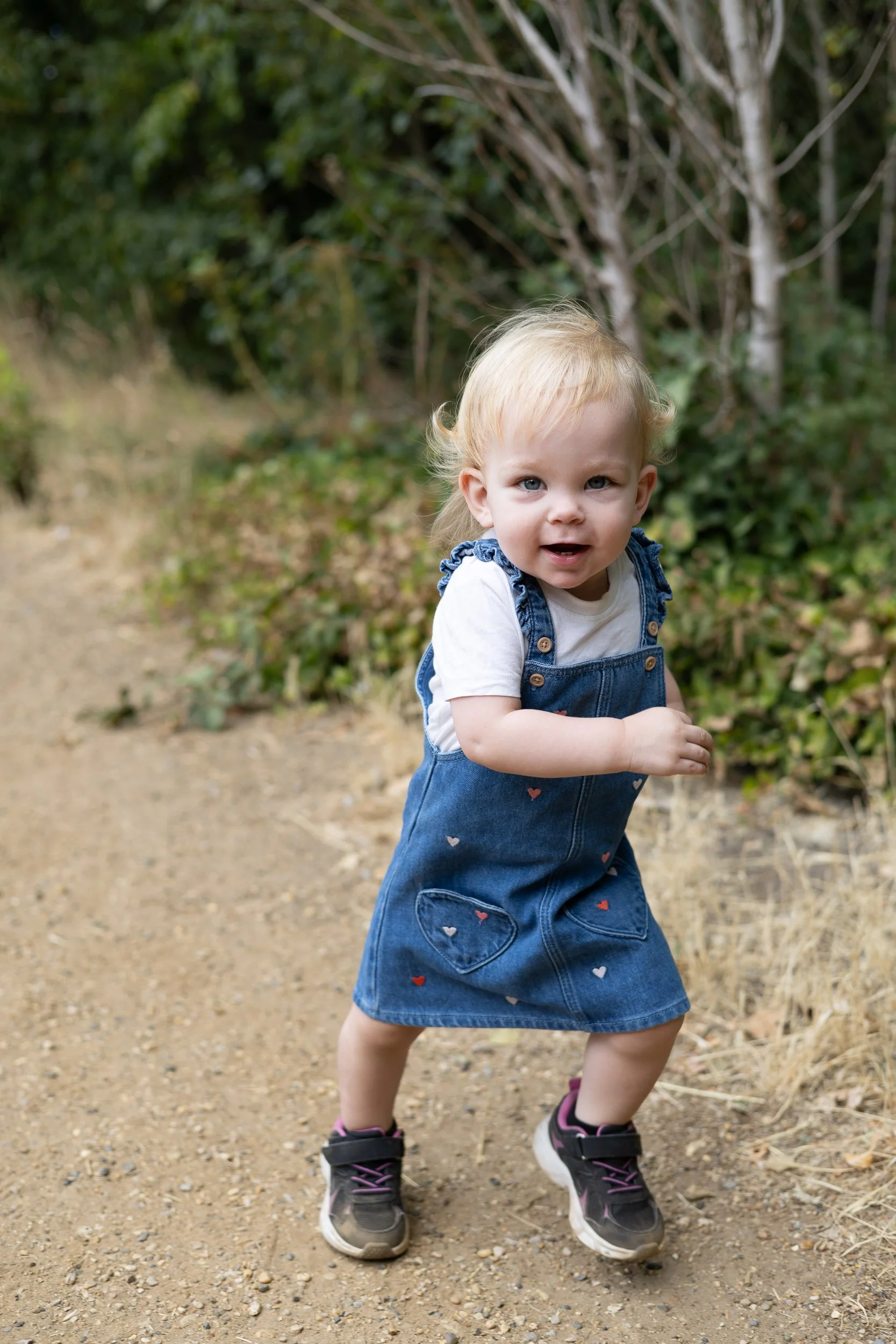 Toddler running around and having fun during the photoshoot in Hampshire,