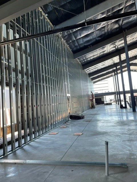 Demising wall framing.